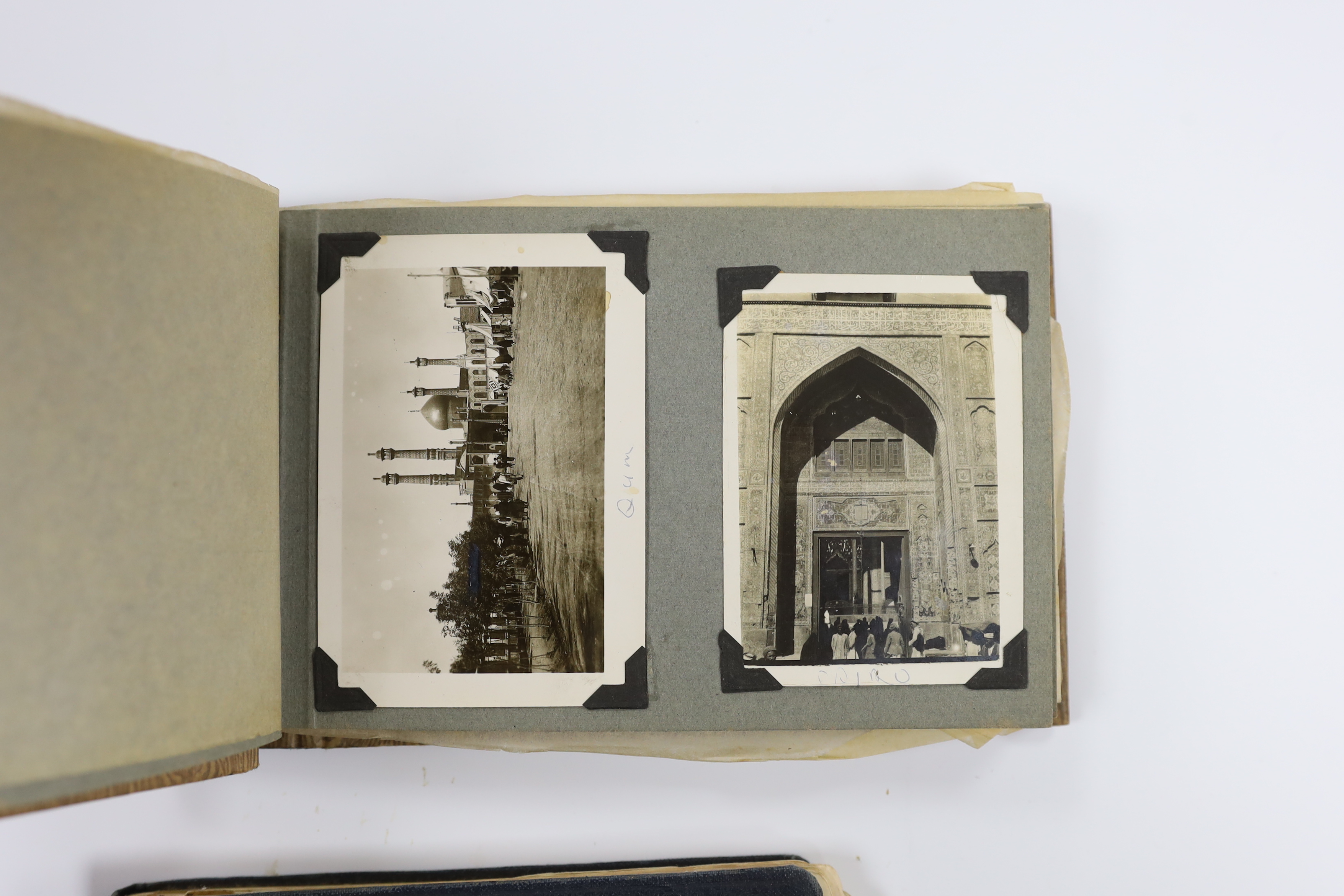 Two albums of early 20th century postcards and black and white photographs, many with naval interest, including photographs of battleships, and naval manoeuvres, during the 1930s, scenes of Bermuda, portraits of soldiers